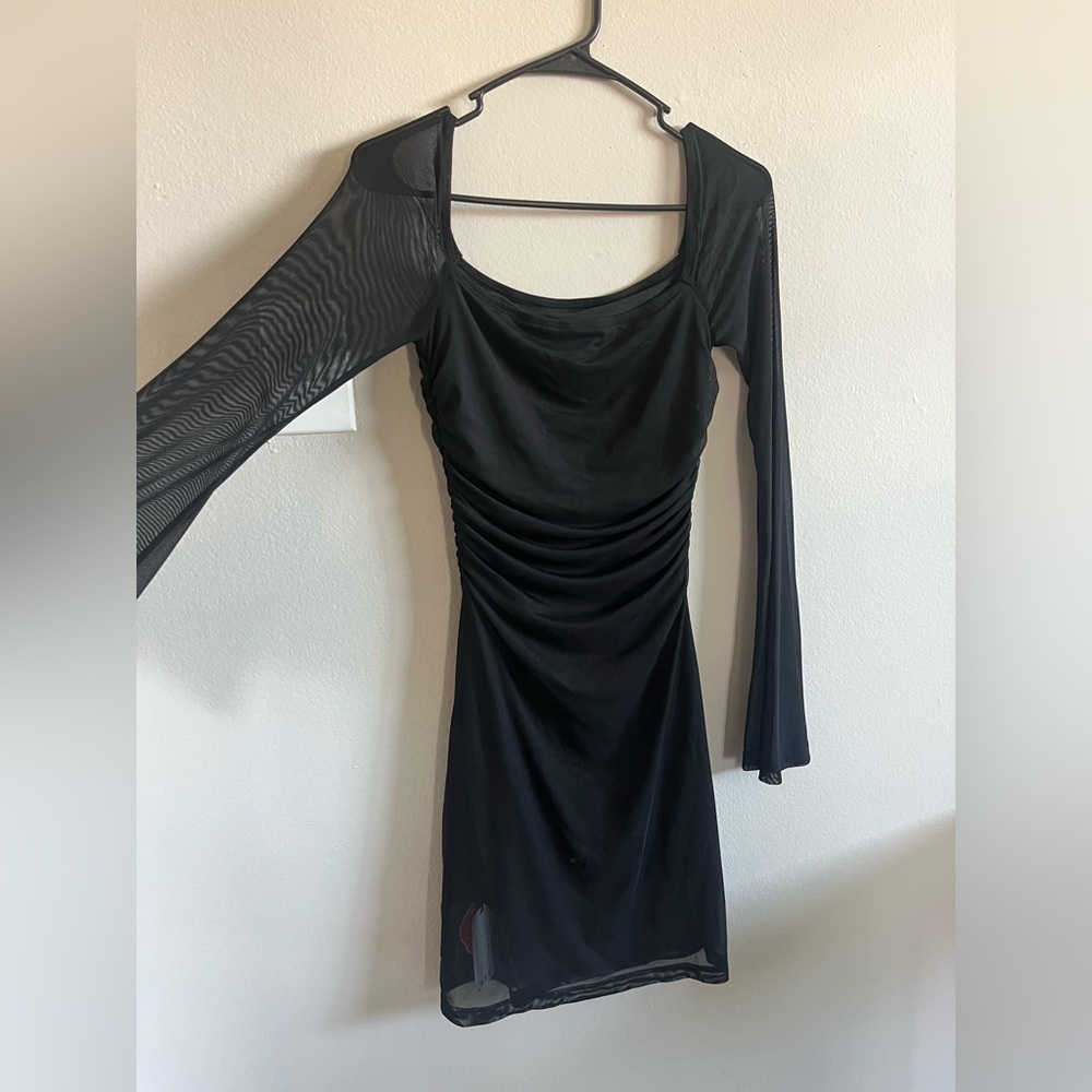 Sheer sleeve dress, never worn.